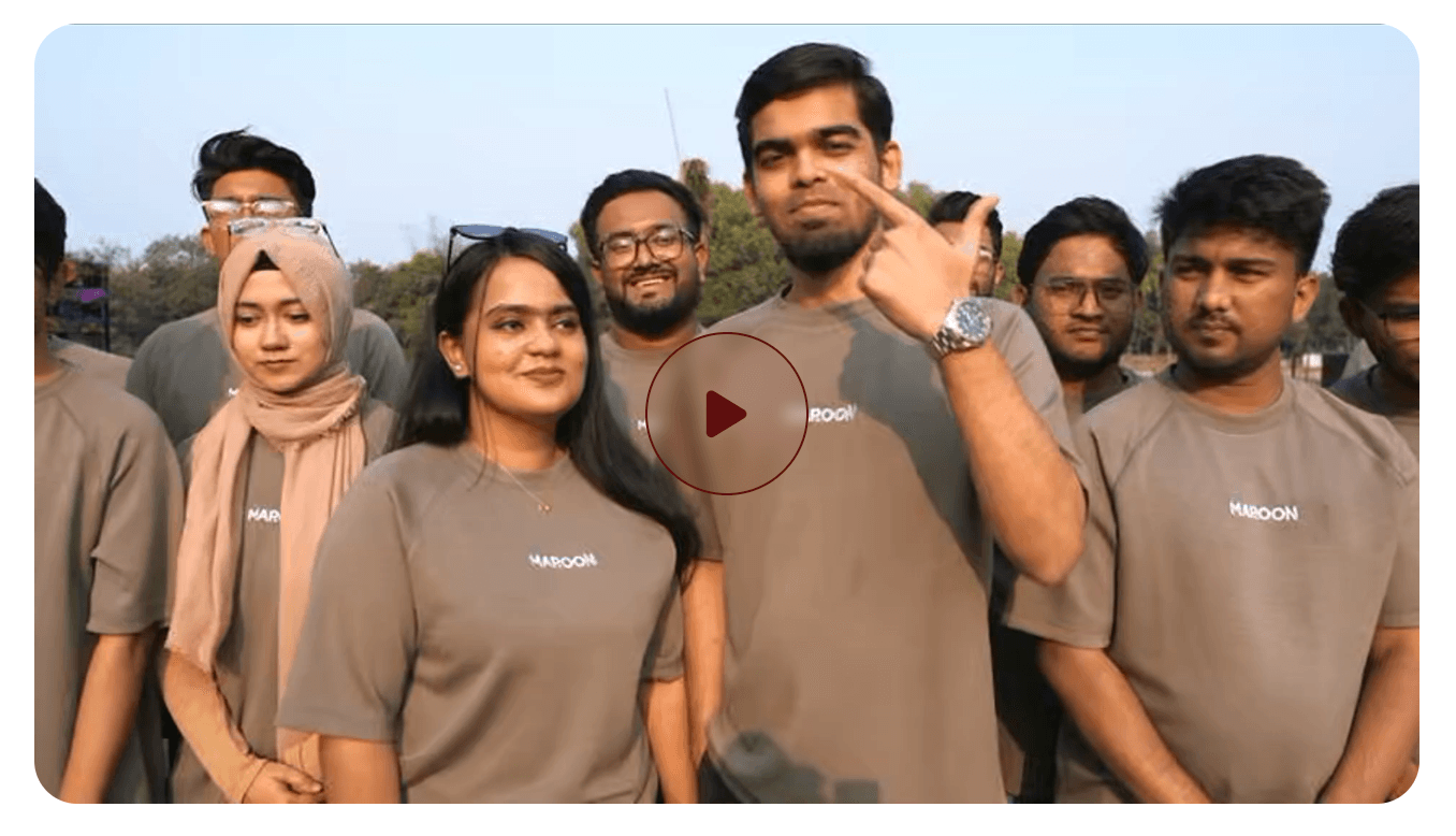 Maroon team standing together outdoors